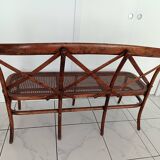 CURVED WOOD AND CANE BENCH