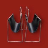 Pair of vintage magazine racks in chromed metal and black leatherette - 1970s