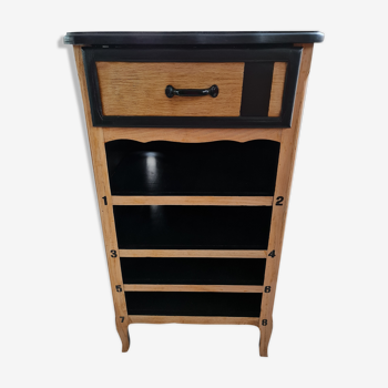 Raw oak and matte black storage cabinet on stencil top and transfer