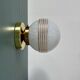 Vintage glass globe wall or ceiling light in white and gold from Clichy.