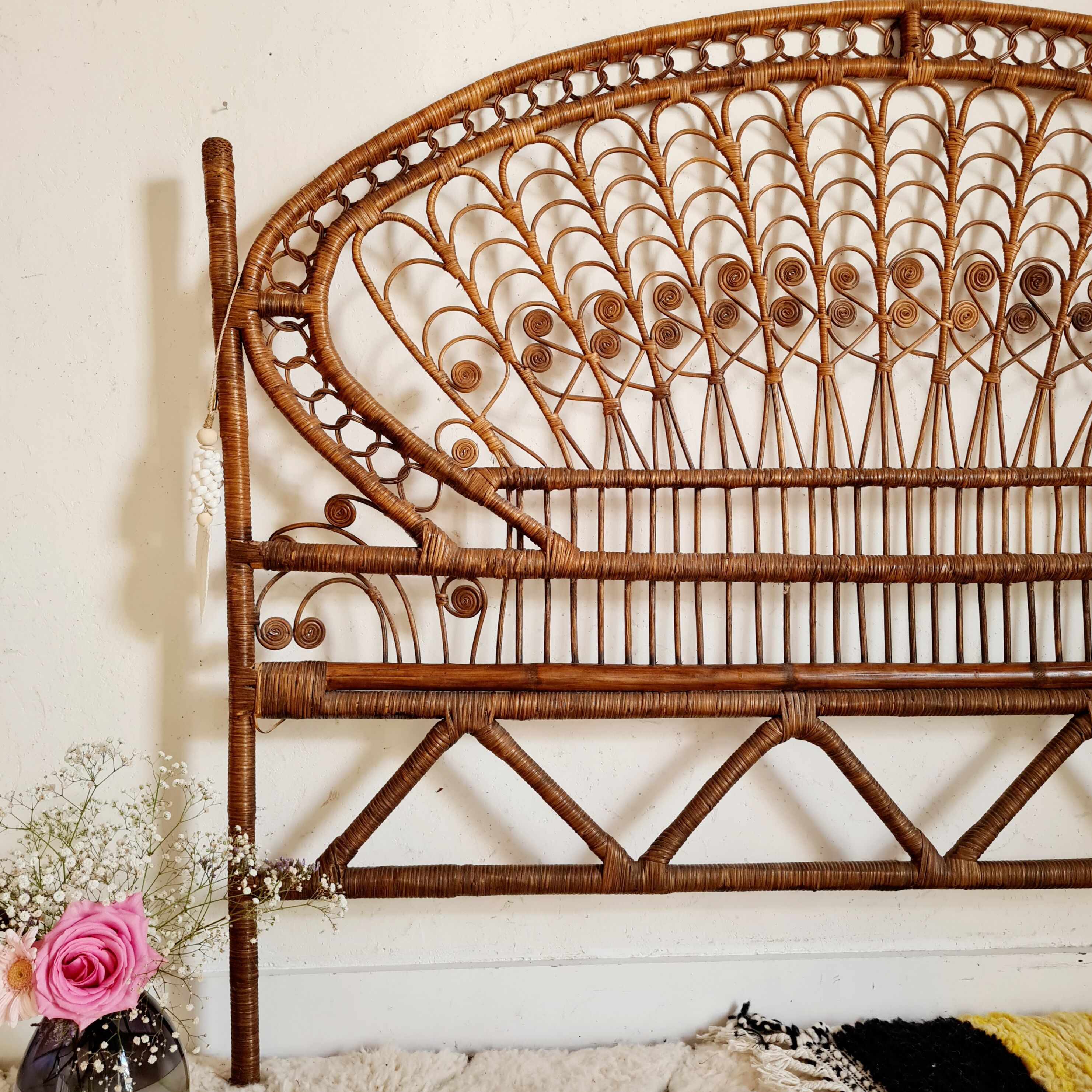 Peacock headboard in vintage rattan