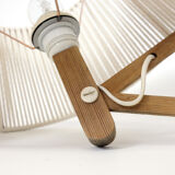 Pair of pine accordion sconces with cotton rope lampshade.