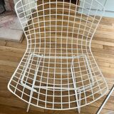 2 white Bertoia chairs