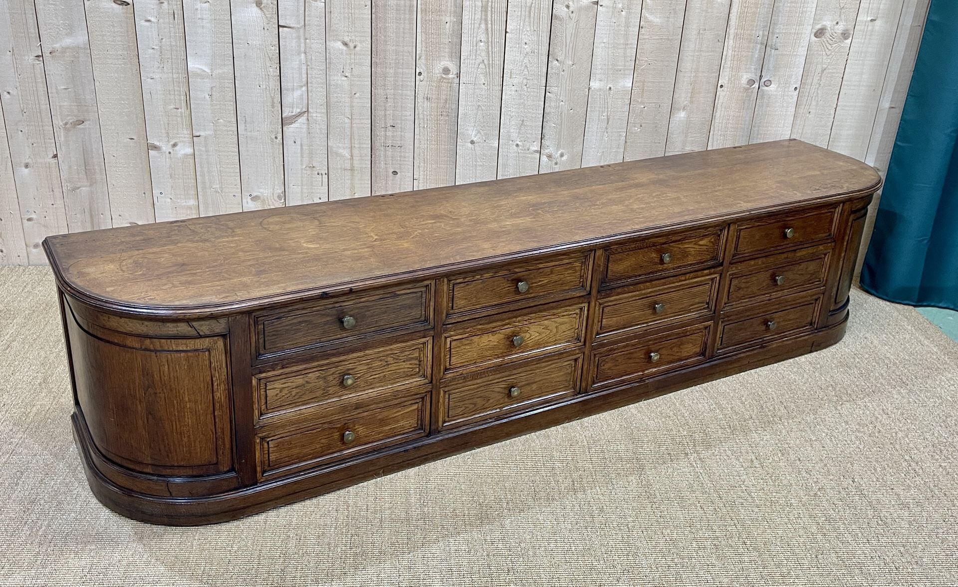 Long low oak countertop with 12 drawers - early XXth