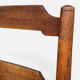 Antique rustic armchair in walnut and leather, 18th century.