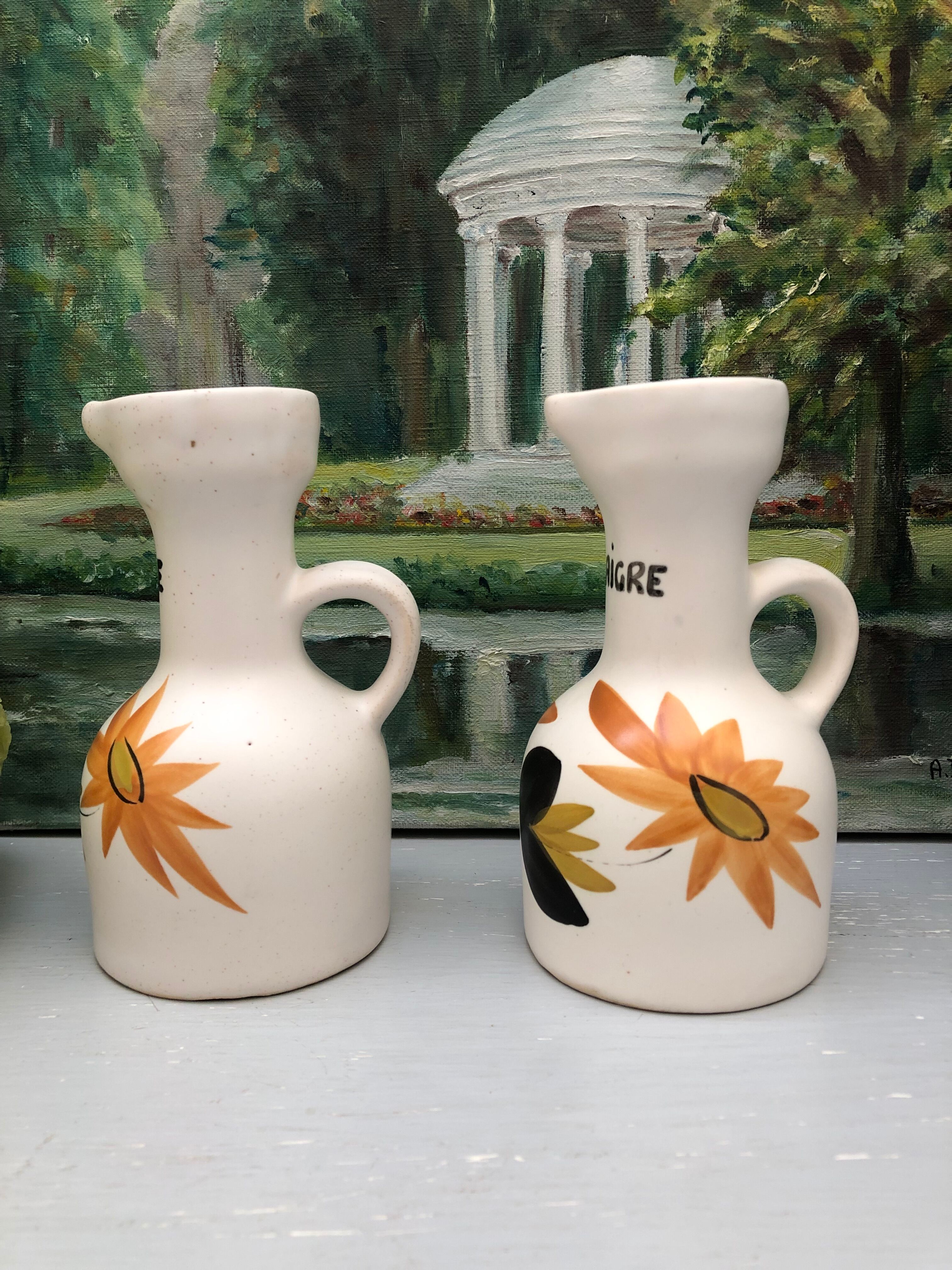 Old vinegar and oil maker with vintage decoration floral motifs