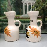 Old vinegar and oil maker with vintage decoration floral motifs