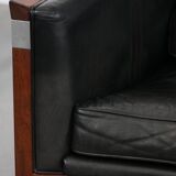 Black Art Deco cowhide leather and wooden design armchair with a high back