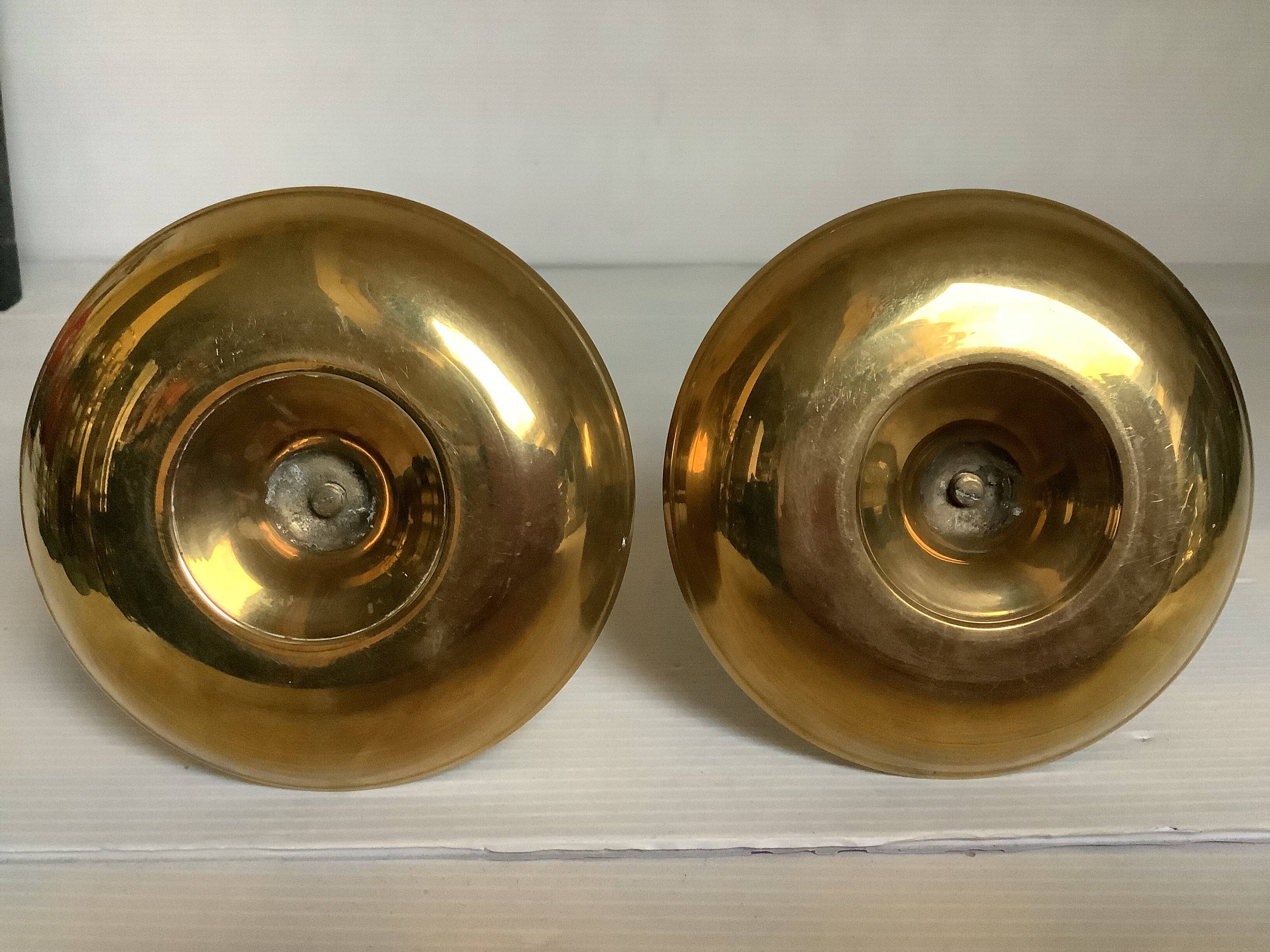Pair of brass cellar rat candlesticks