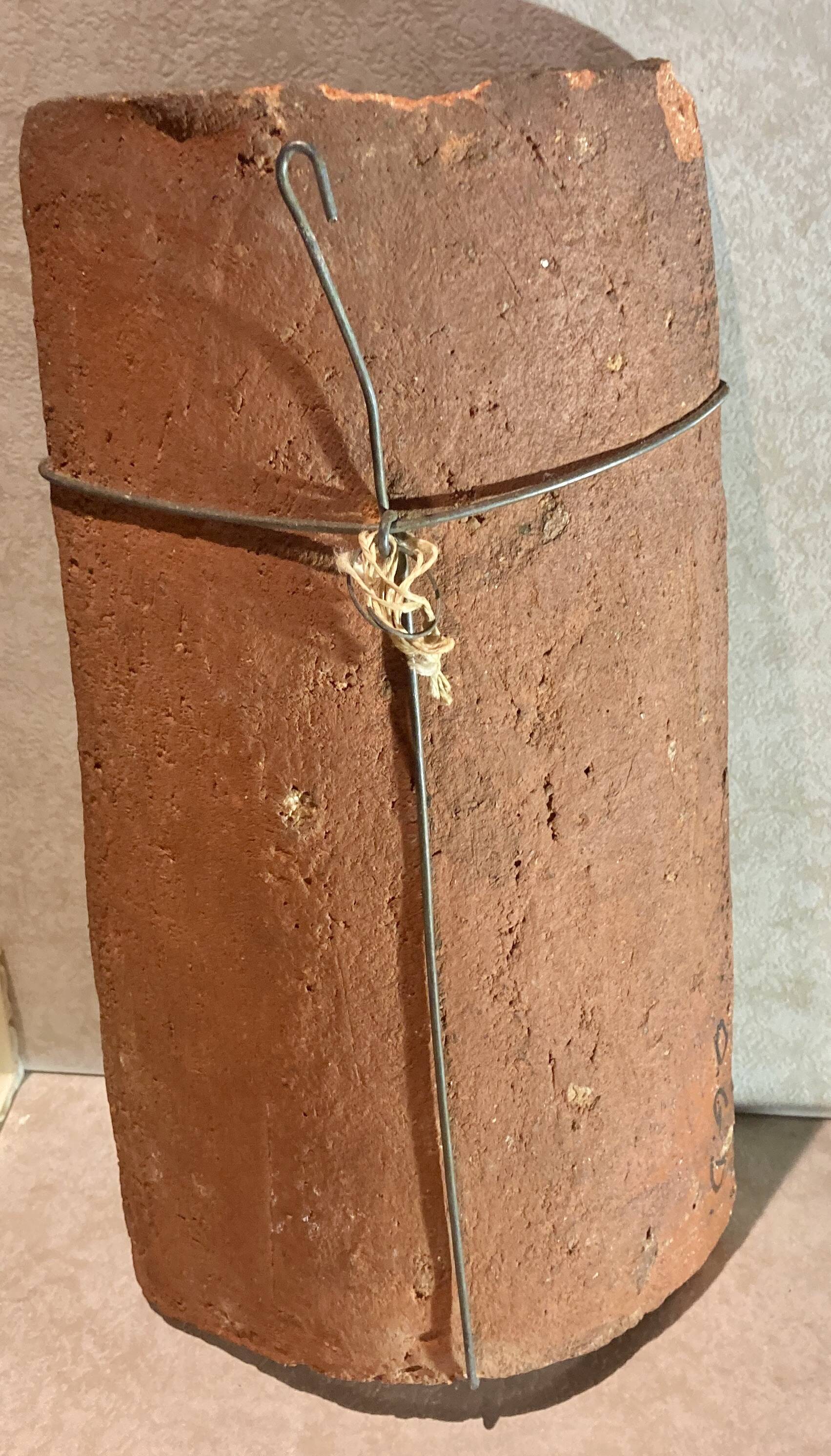 Terracotta tile with enamel decoration of a lady of the high nobility signed OGD