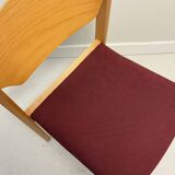 Scandinavian style oak and burgundy chair without armrests
