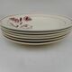 Six assiettes plates en faïence