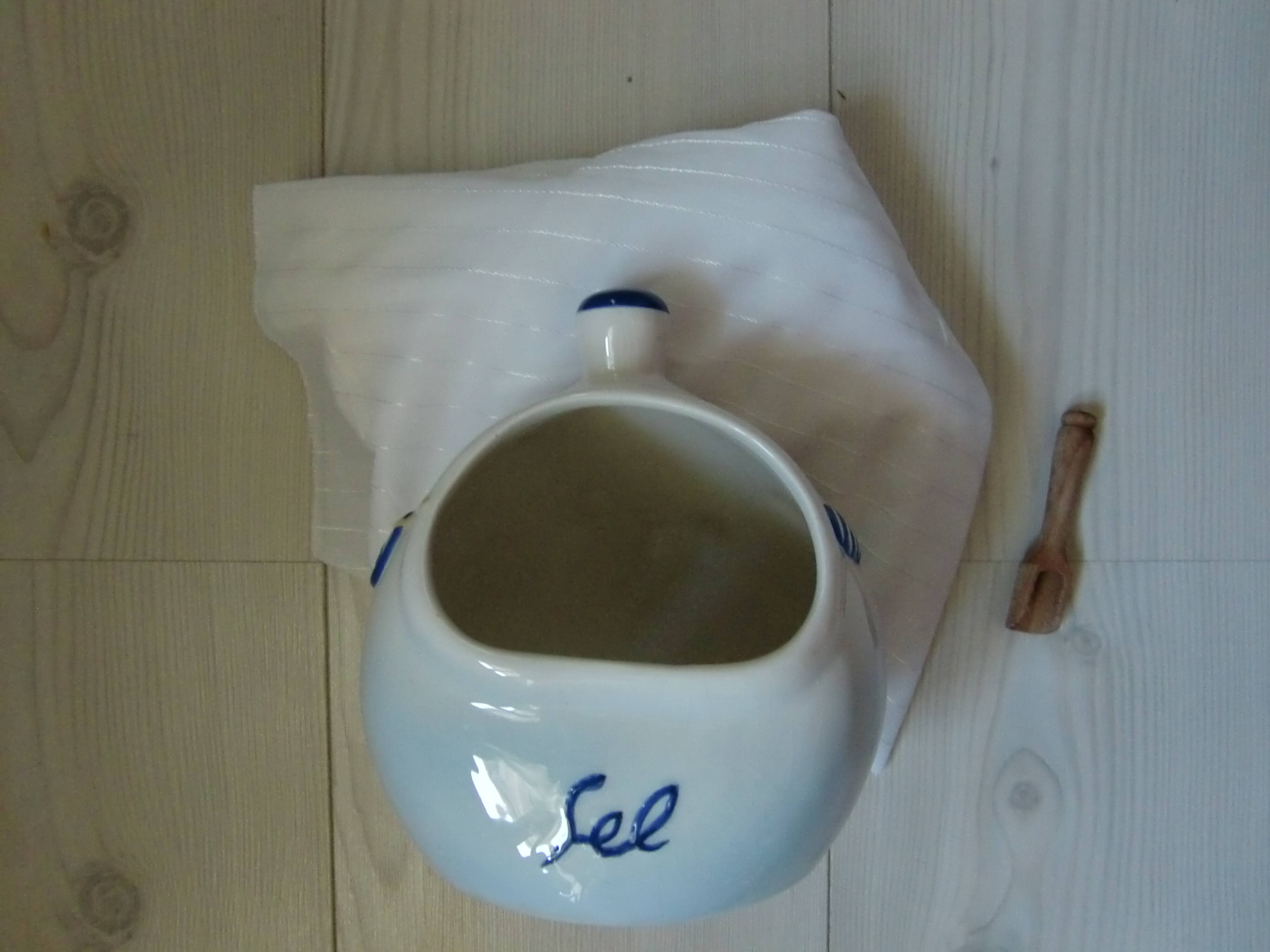 Ceramic salt pot and wooden spatula