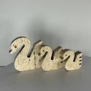 Swans Enzo Mari travertine for Fratelli Mannelli, Italy, 1970.