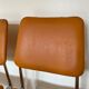 Paire de chaises chromé et skai orange