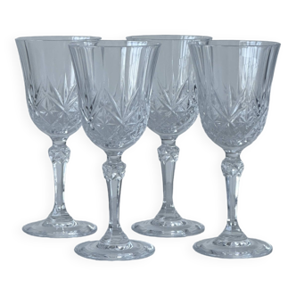 4 old wine glasses, in chiseled and thick glass.