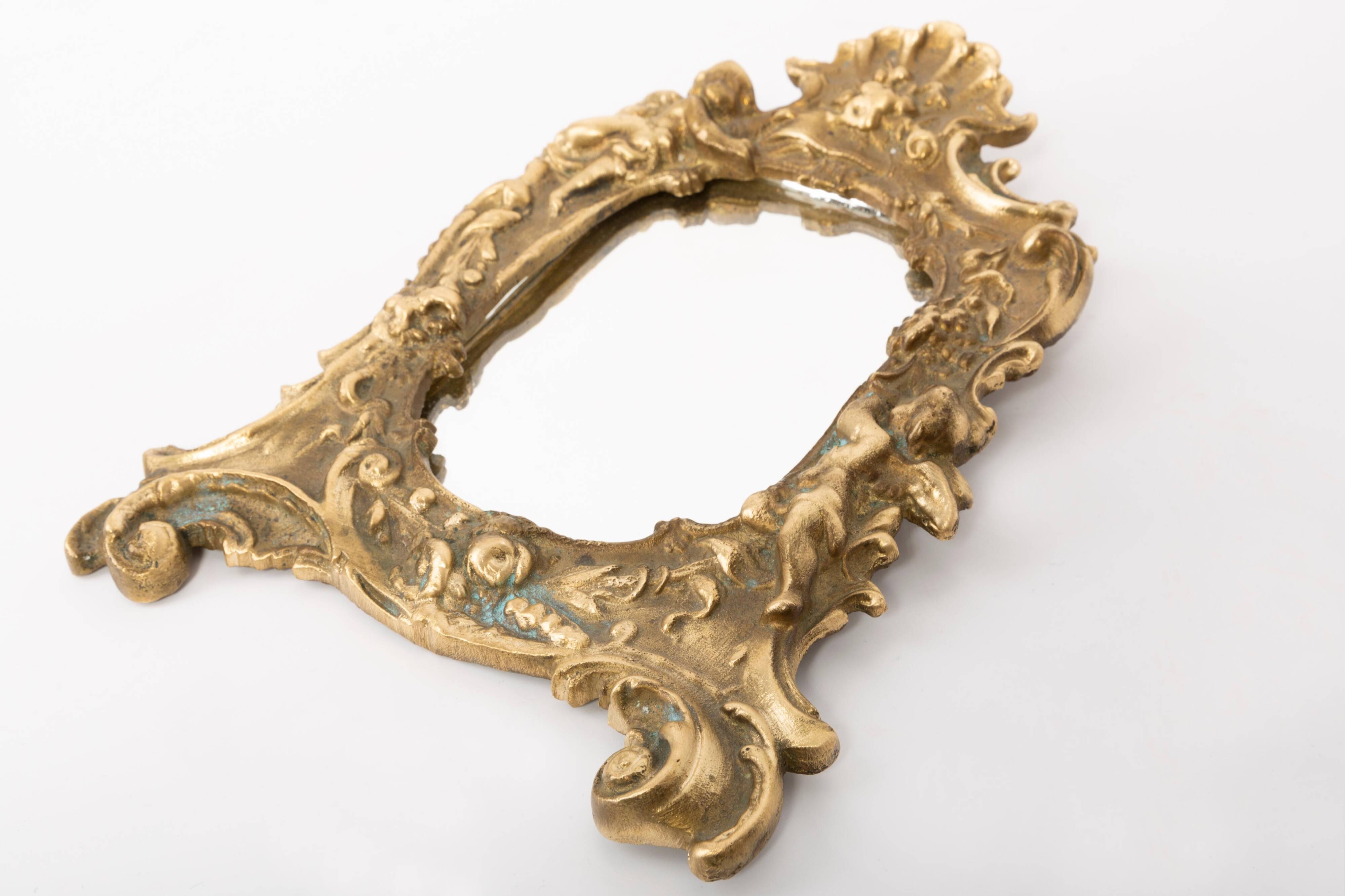 Miniature vintage gold mirror with angels, Italy, 1960s