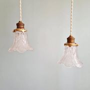 Art Deco trio of pendant lights/table lamps in clear glass, 1920s-30s.