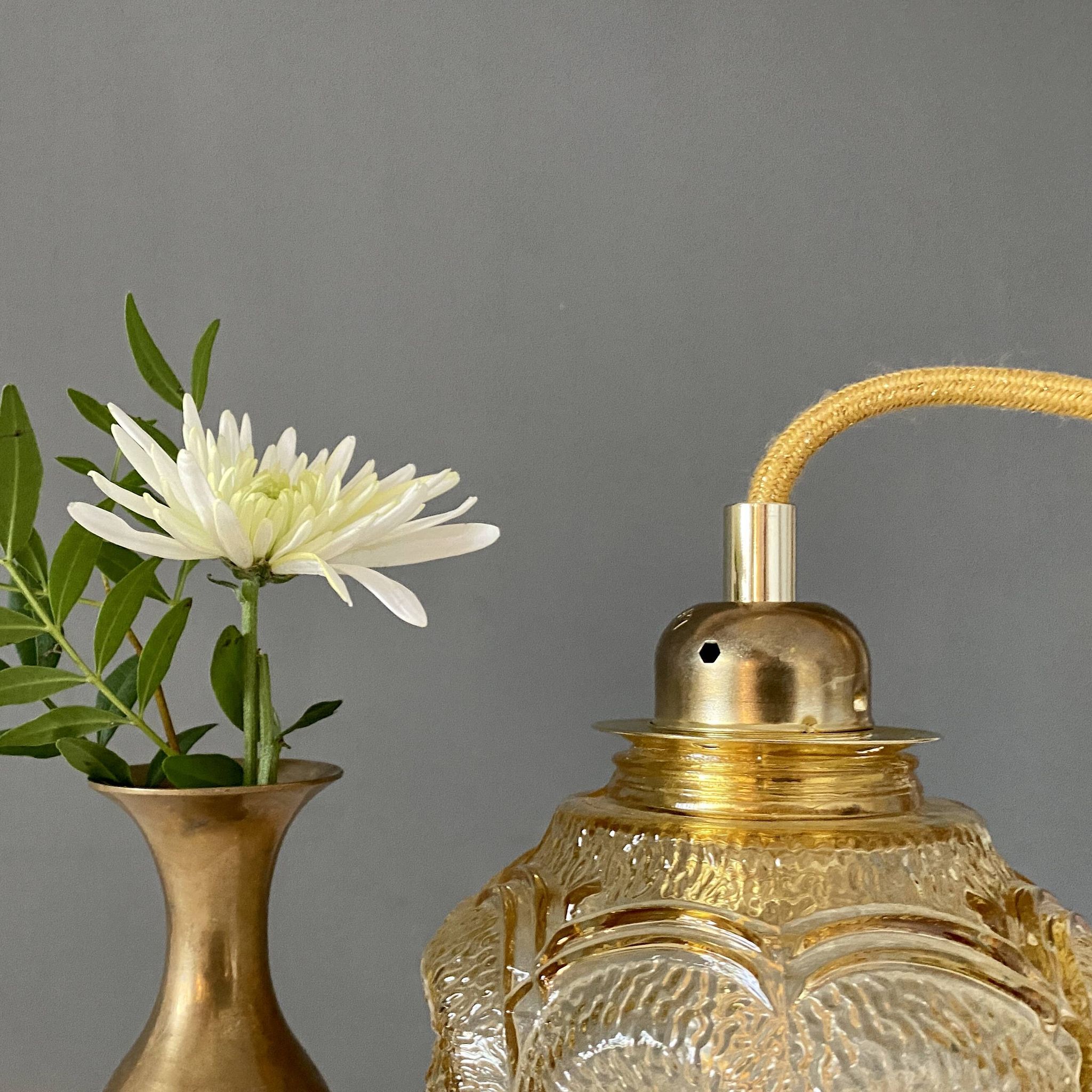 Bladeuse tulipe vintage en verre ambré