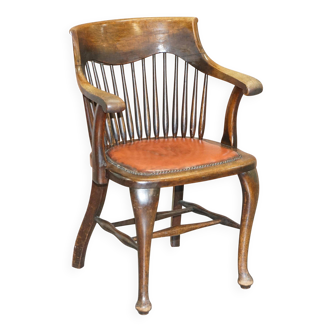 Antique English Edwardian captain's chair in oak by Ralph Johnson.