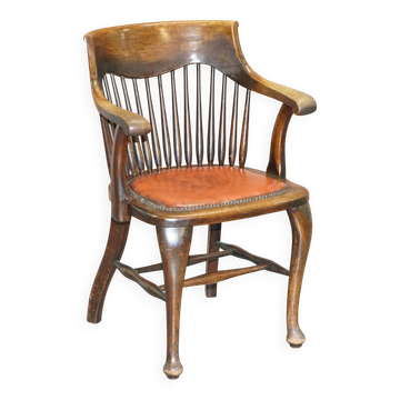 Antique English Edwardian captain's chair in oak by Ralph Johnson.