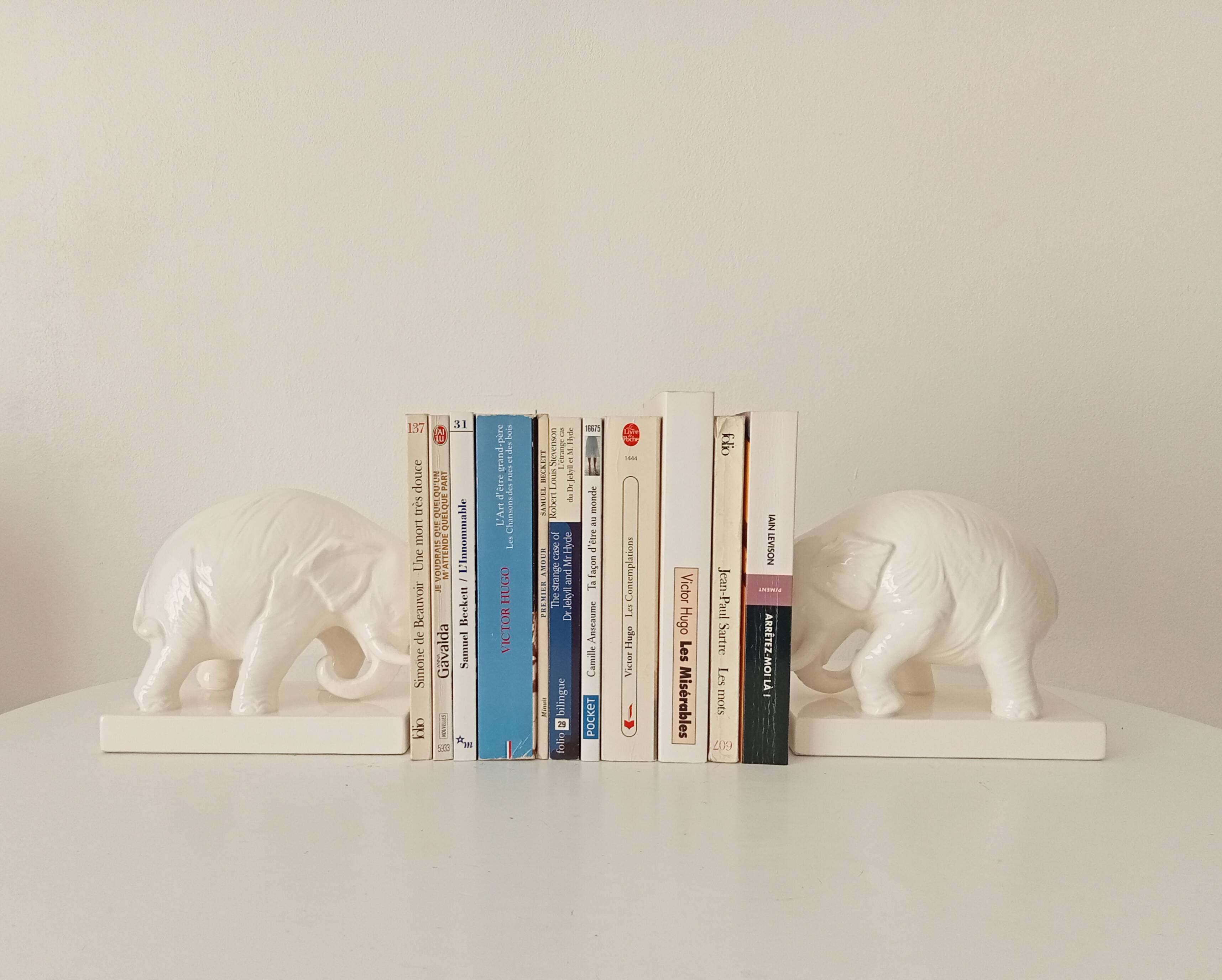 Pair of antique glazed ceramic bookends