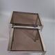 Vintage 1970s nesting tables in chrome and smoked glass, mid-century modernist style