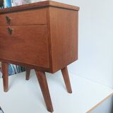 Wooden bedside table with vintage compass legs