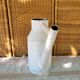 White vintage watering can