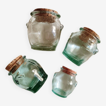 Small glass jars and corks