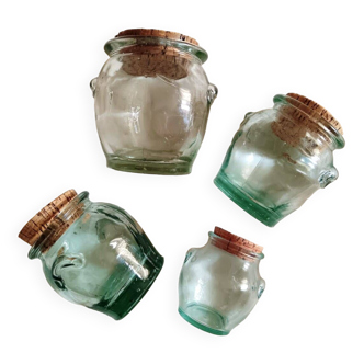 Small glass jars and corks