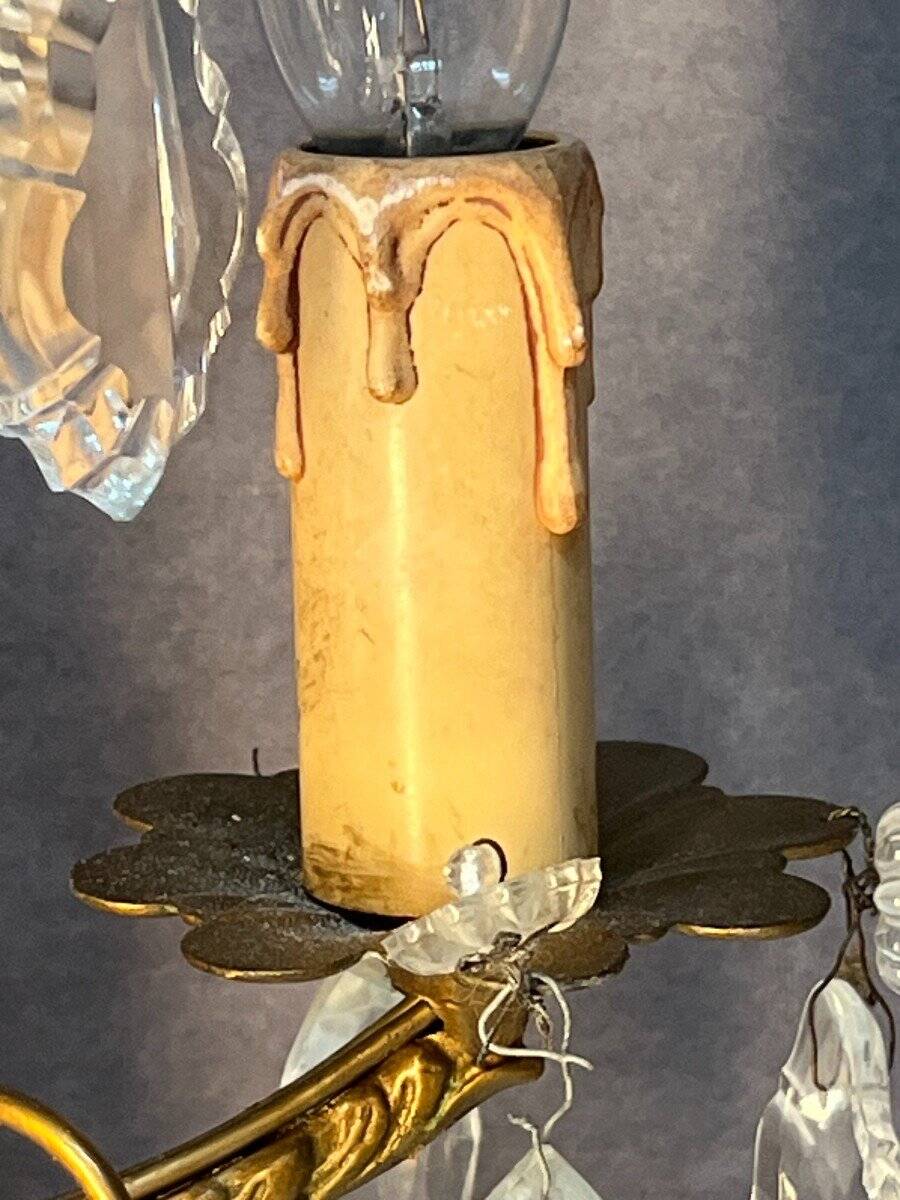 Pair of antique chandeliers, in brass with cut glass pendants, early 20th century