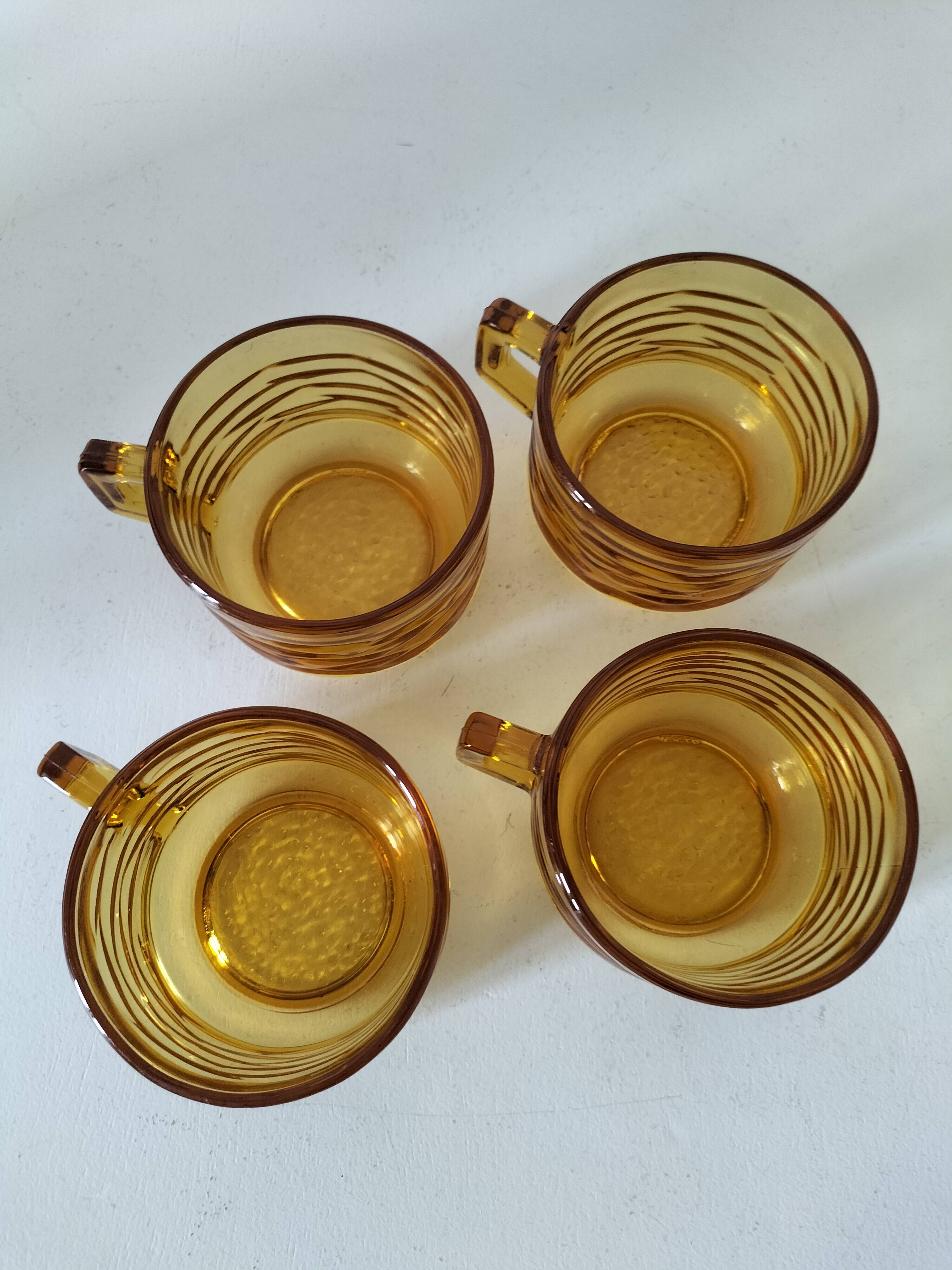 Set of 4 vintage amber glass mugs with textured 70s design