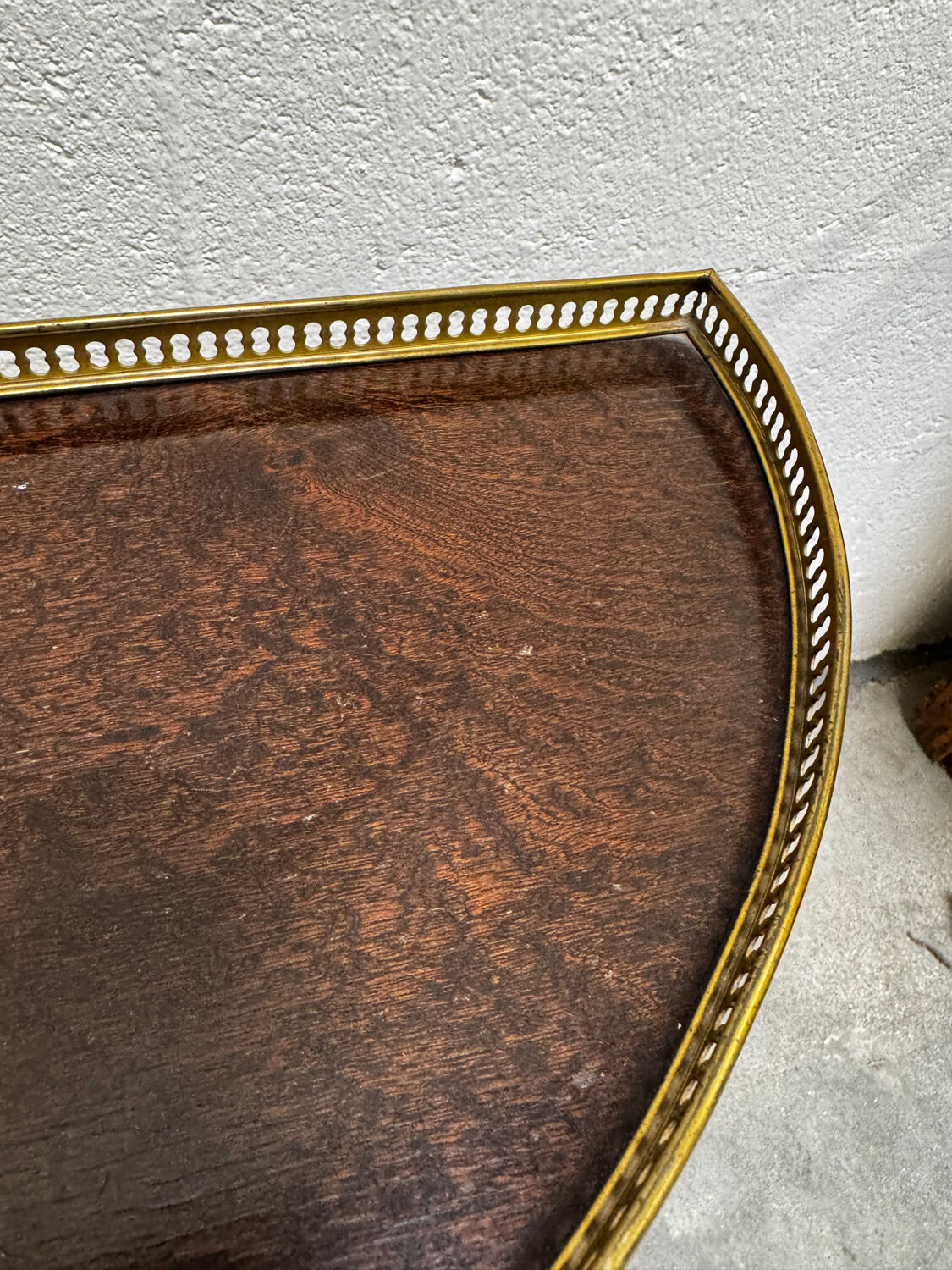 Louis XVI demi-moon console in wood and brass.