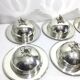 Set of silver-plated serving dishes and bells
