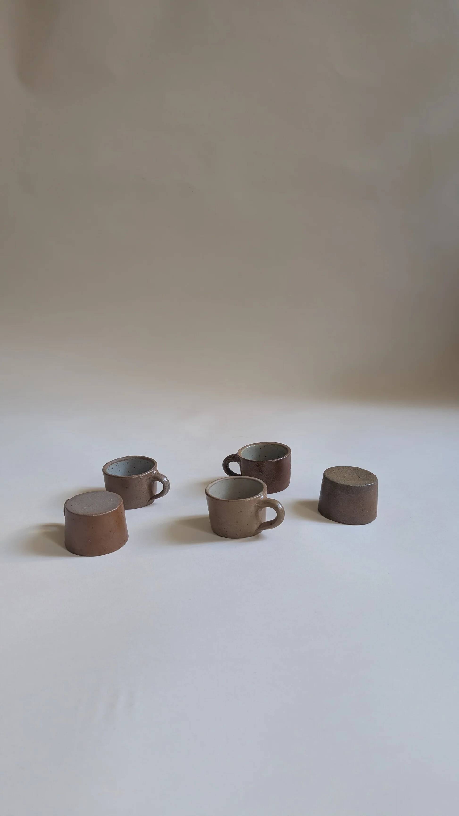 Set of 5 brown stoneware cups