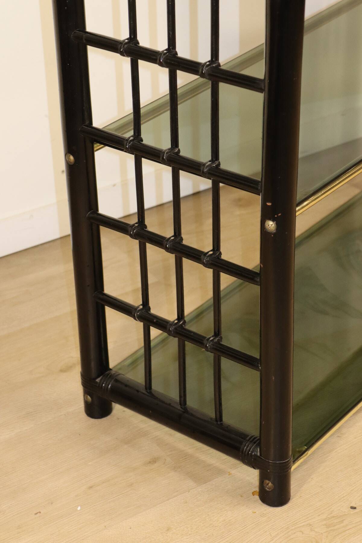 Vintage 1970s shelf in smoked glass with a bamboo-style structure.