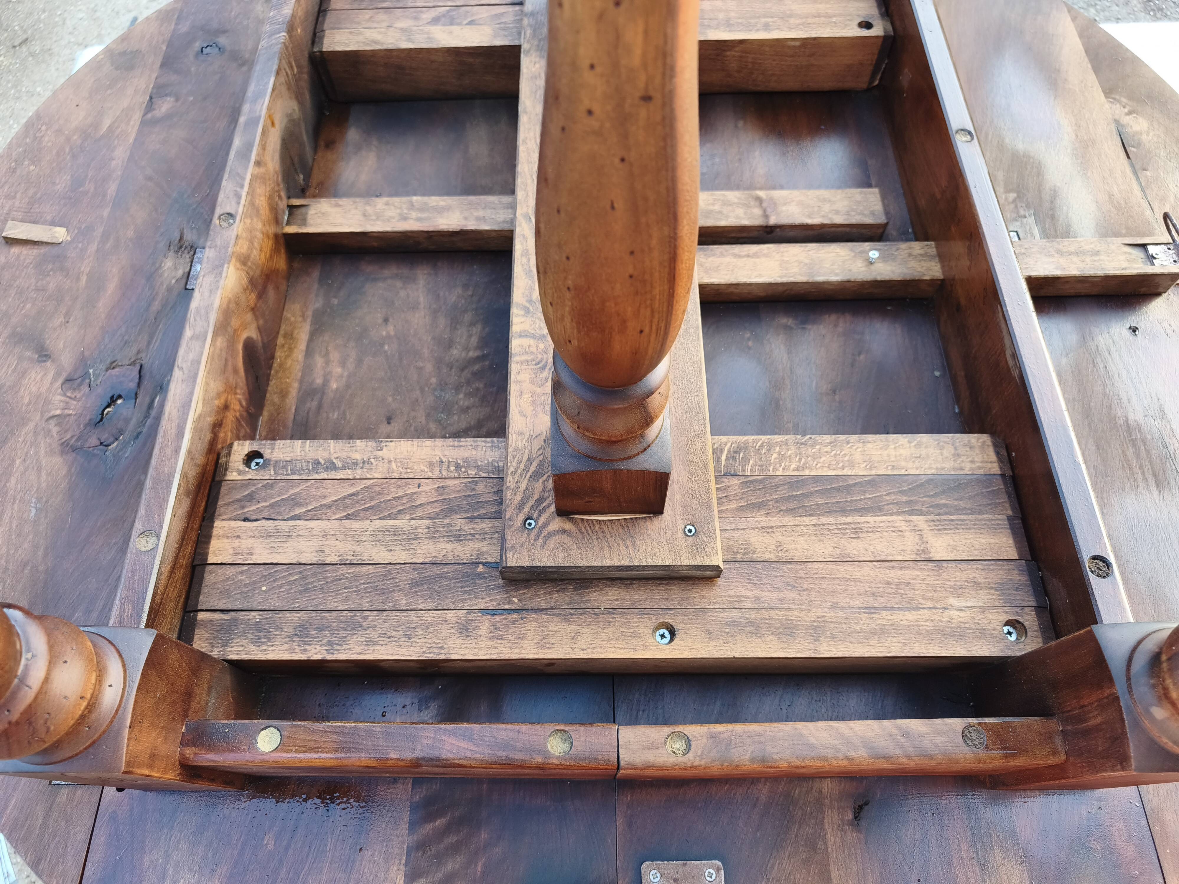 19th-century walnut drop-leaf table.