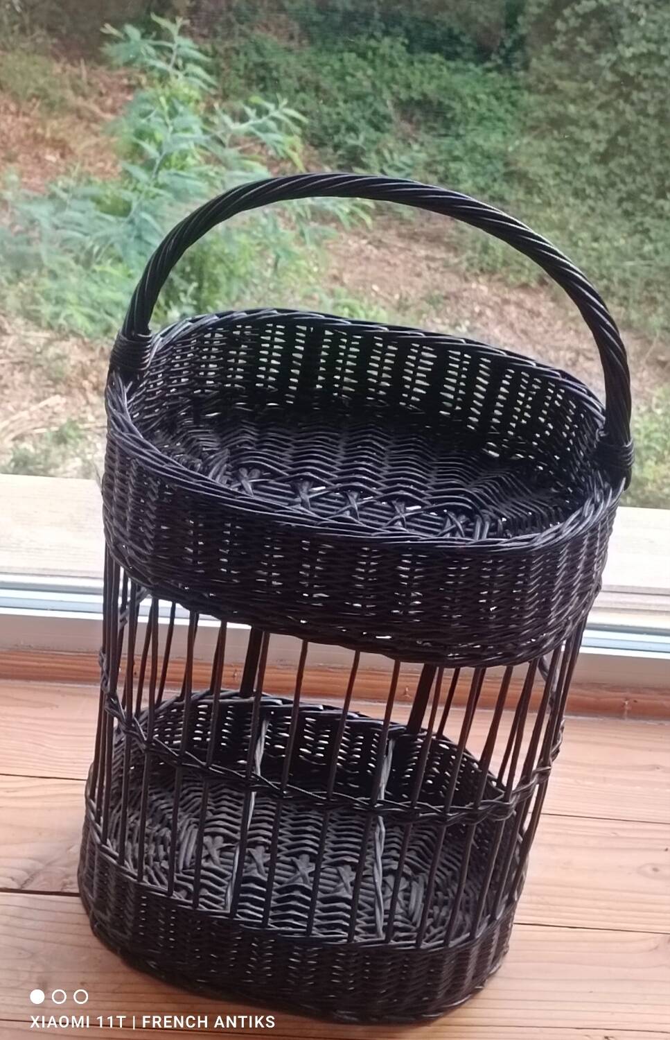 The vintage mini-bar made of wicker and rattan is both decorative and practical.