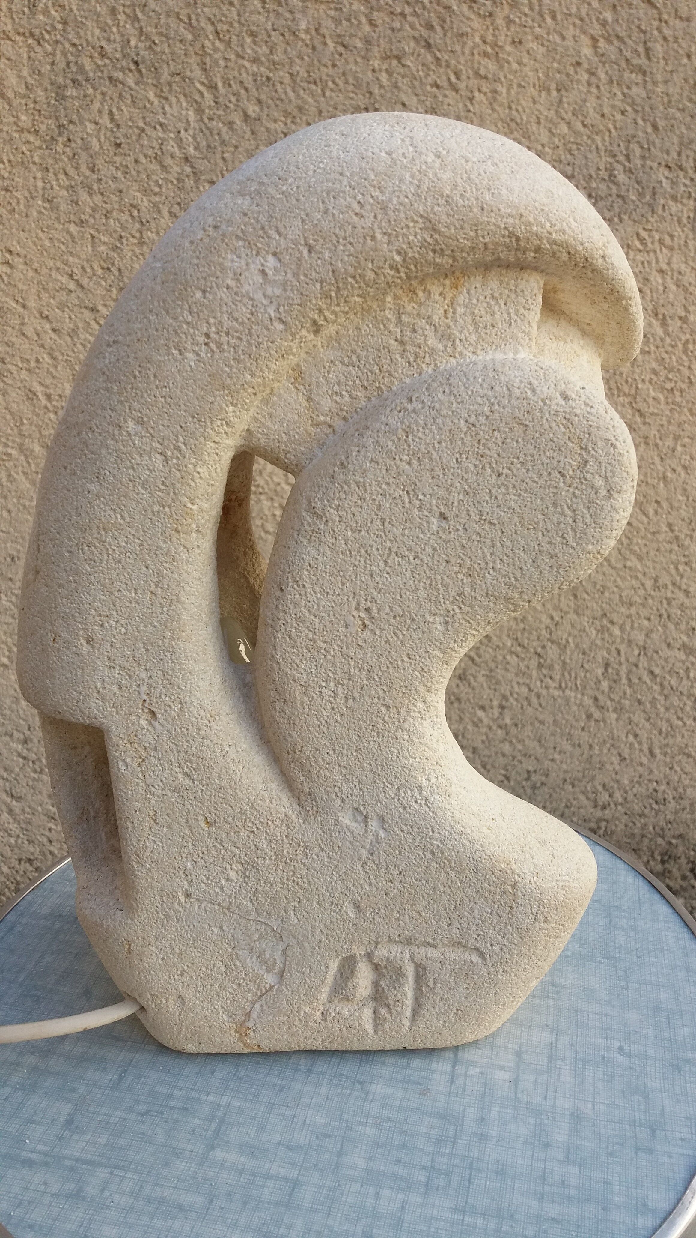 Light stone carved to Albert Tormos