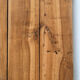 Antique coffee table in solid elm with turned legs.
