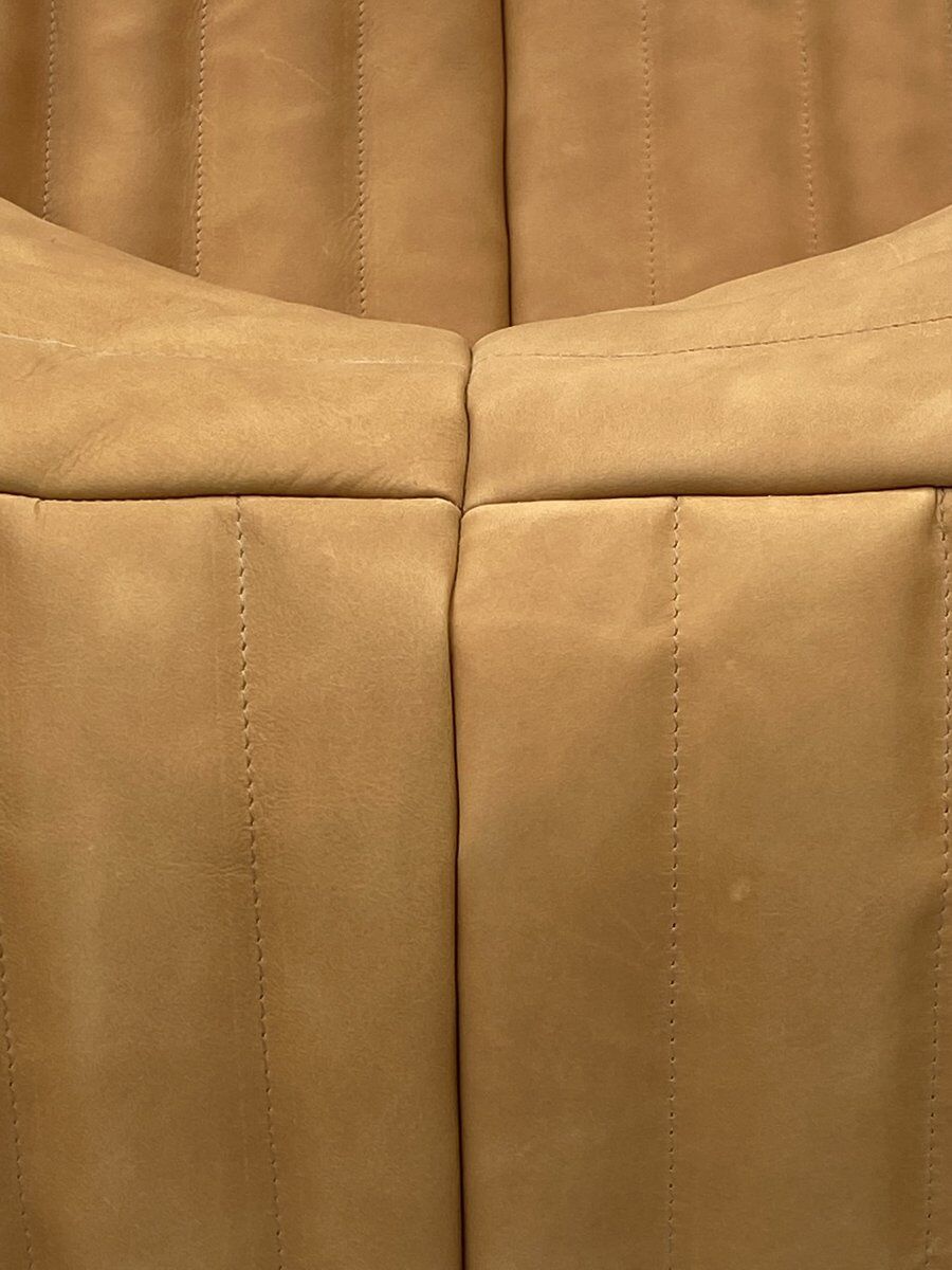 Sandra chair in camel leather by Annie Hiéronimus for Cinna/Ligne Roset.
