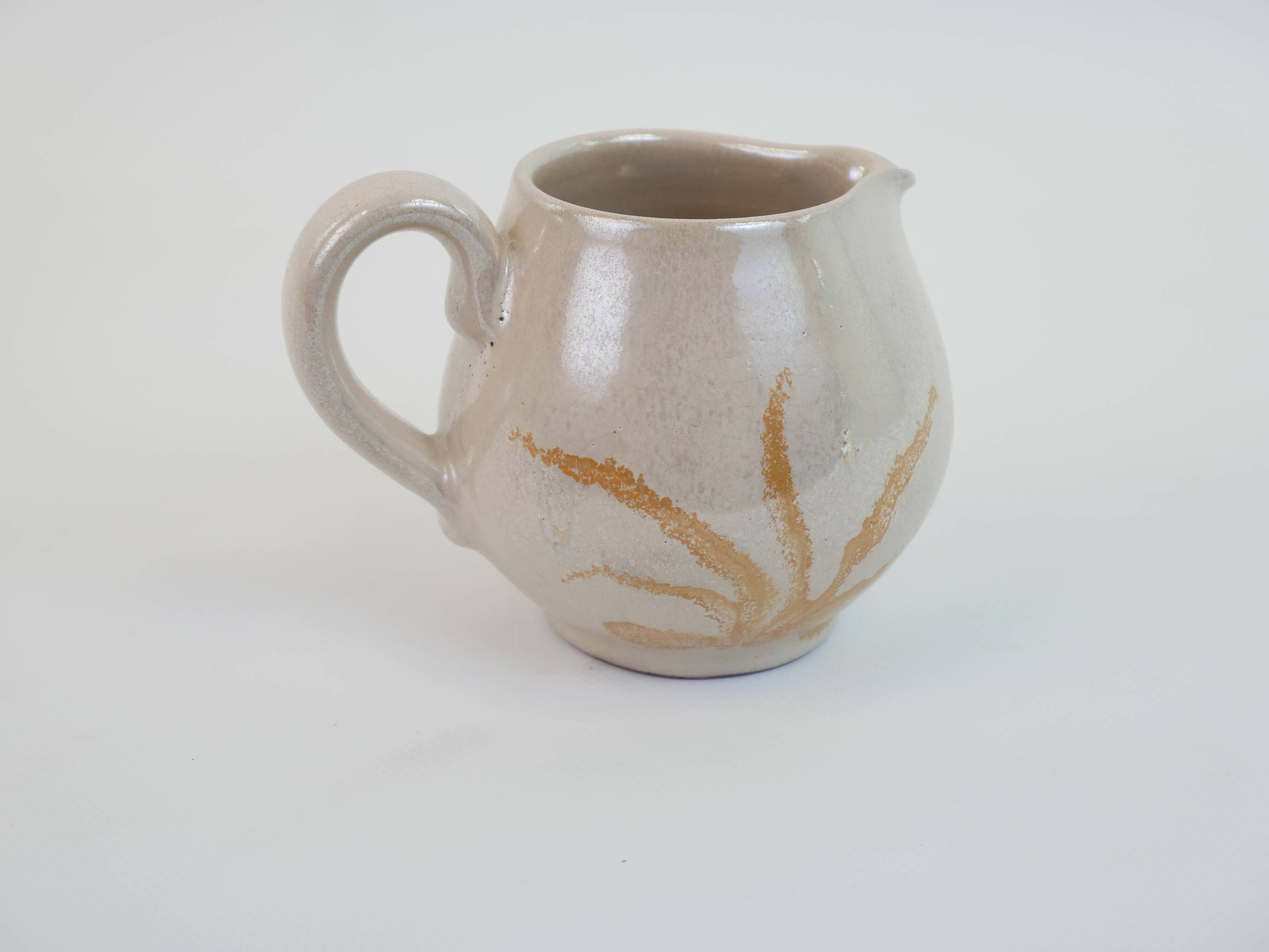 Pair of ceramic milk jugs signed La Roue Vallauris