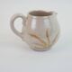 Pair of ceramic milk jugs signed La Roue Vallauris