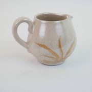 Pair of ceramic milk jugs signed La Roue Vallauris