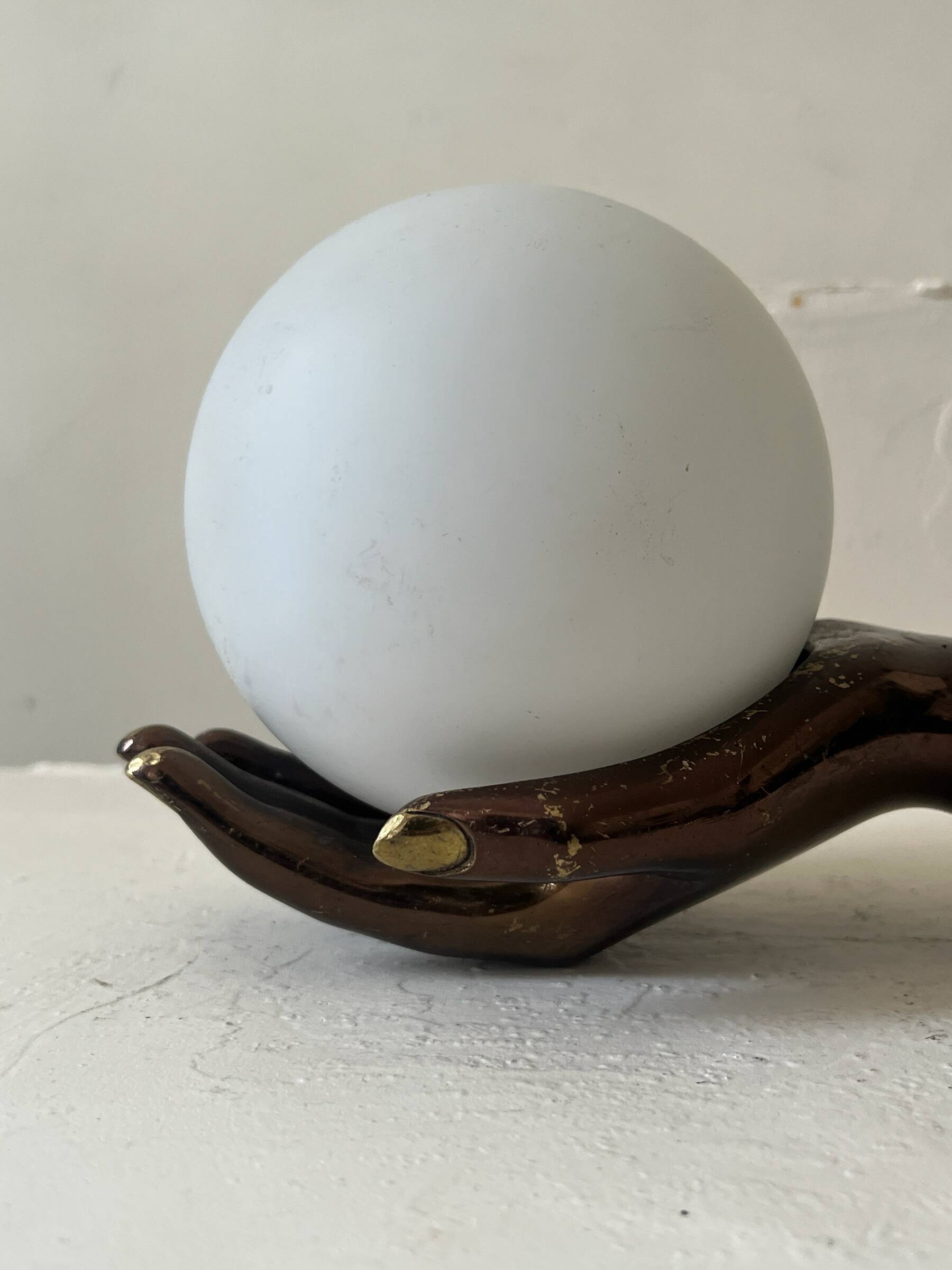 Vintage table lamp hand-crafted in bronze with an opaline globe, Maison Arlus 1970.