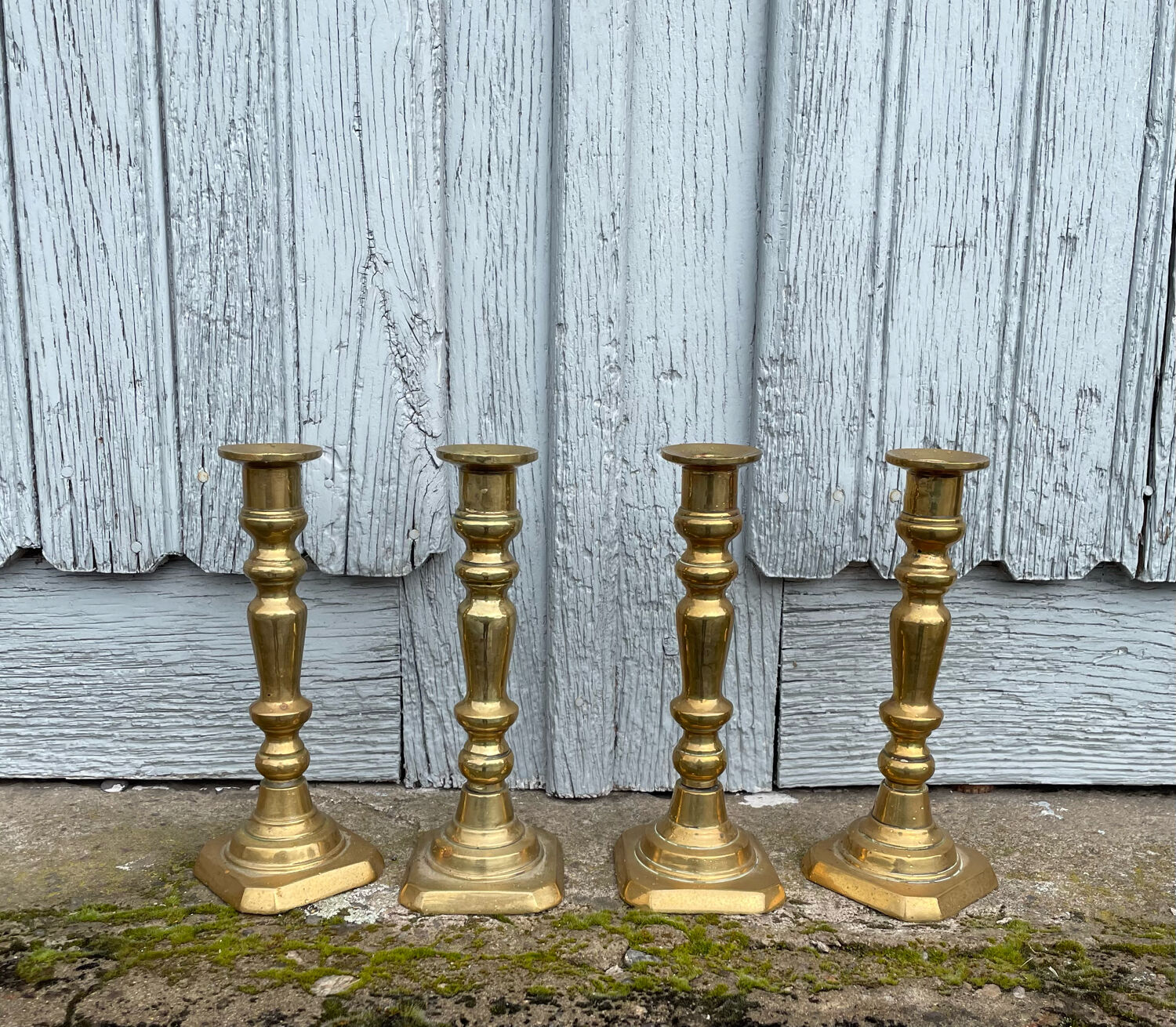 4 Victorian brass candlesticks