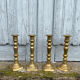 4 Victorian brass candlesticks