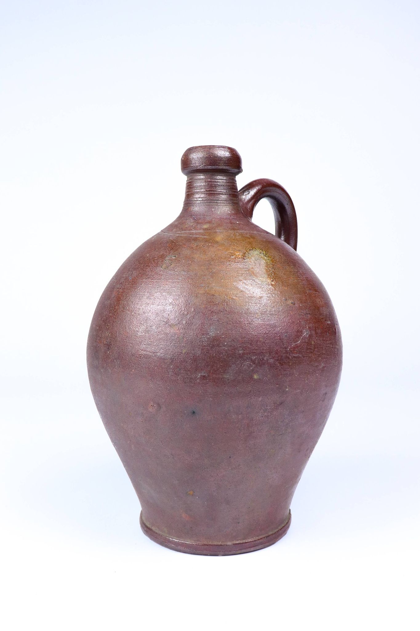 Old enamelled stoneware jug