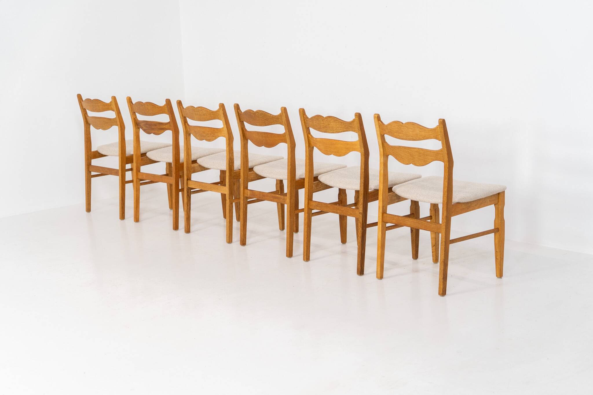 Set of 6 brutalist chairs in oak by Henning Kjaernulf